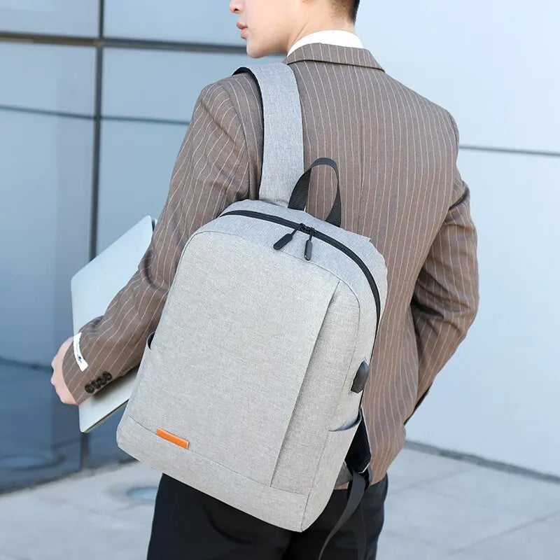 15.6" Men's Business Laptop Backpack: Sleek Design, USB Charging, Lightweight for School, Travel, and Commuting.